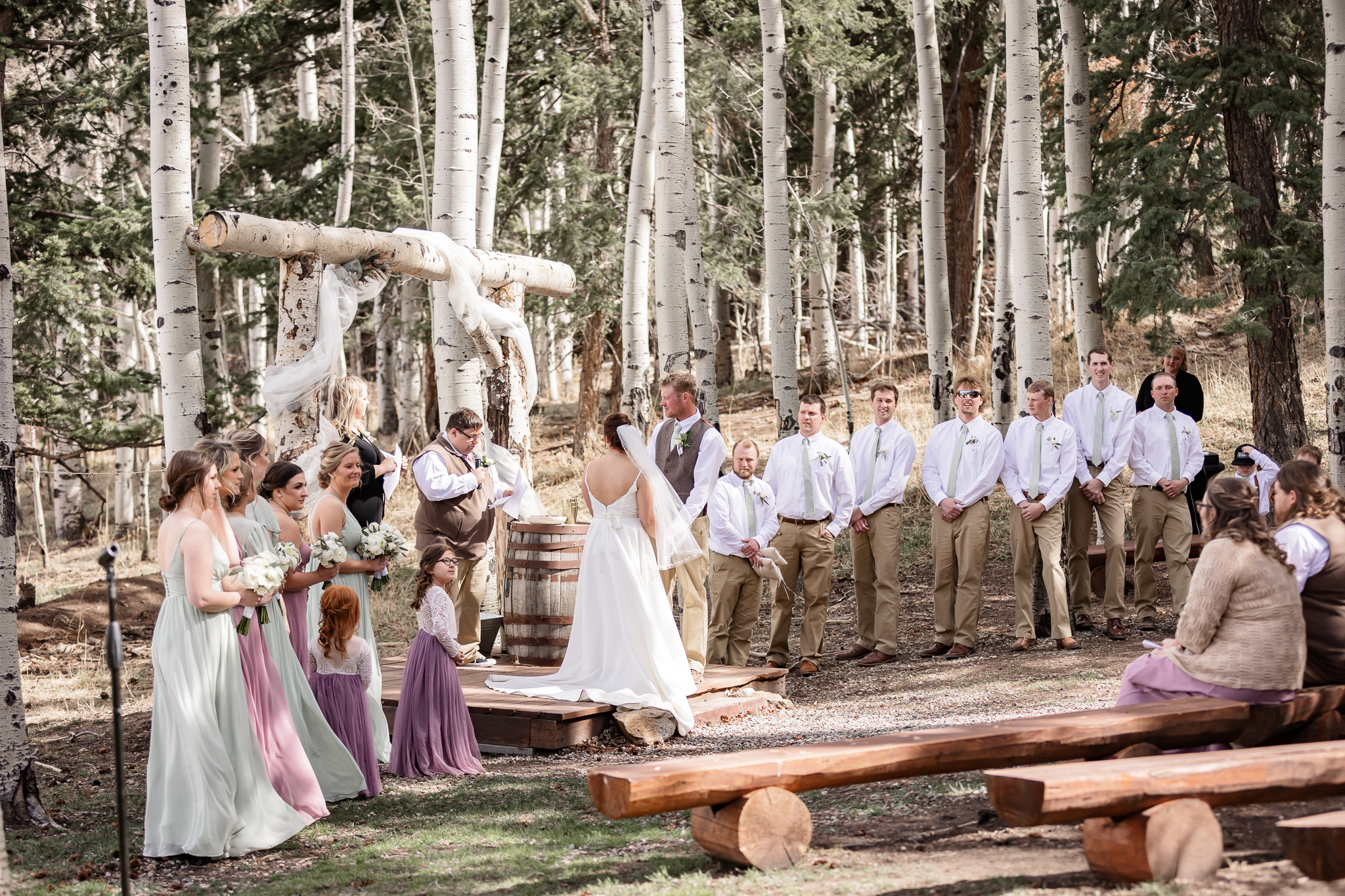 Deer Creek Mountain Camp wedding venue in Bailey Colorado | Dahli Floral | Cottage Creations Custom Confections 
 Elite Beauty Co | Magnifica Bella | Mountain wedding venue